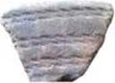 Фрагмент кераміки епохи міді—бронзи, знайдений на Царині (ІІ тис. до н.е.).